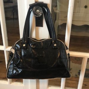 Tod’s black leather bowling bag purse